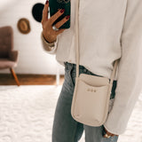 On The Go Cream Phone Holder Crossbody Bag